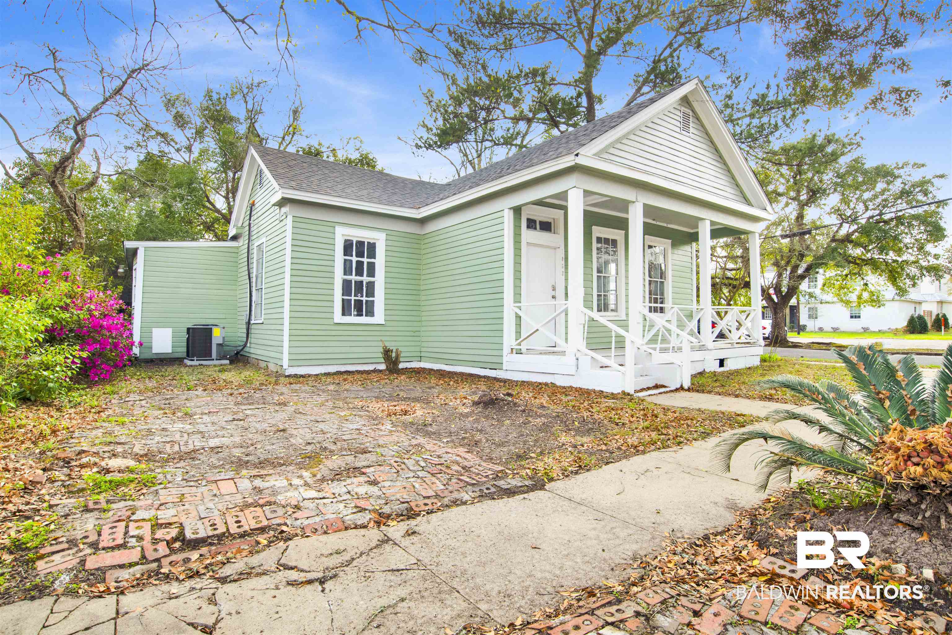 1063 Selma Street Mobile, AL 36604 - Photo 25 of 32 View of front of house featuring covered porch and a shingled roof