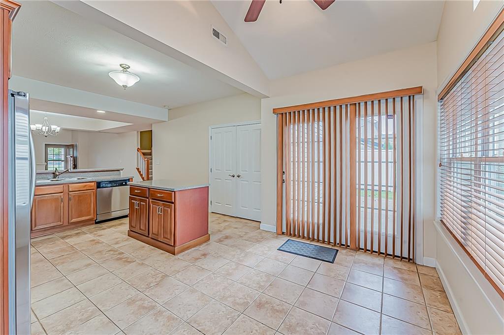 230 Berkeley Way, Unit B Monroeville, PA 15146 - Photo 12 of 25 a kitchen with stainless steel appliances granite countertop a refrigerator and a sink