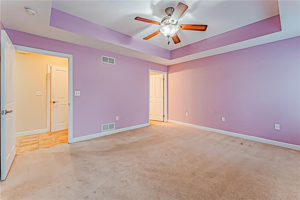 230 Berkeley Way, Unit B Monroeville, PA 15146 - Photo 14 of 25 an empty room with ceiling fan and window