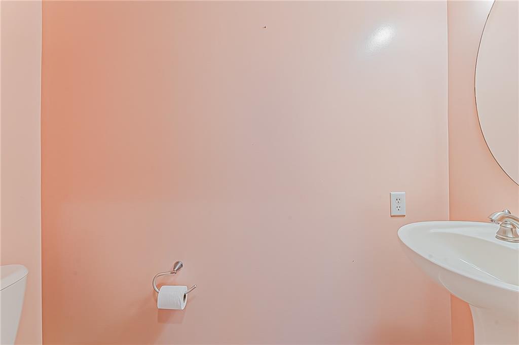 230 Berkeley Way, Unit B Monroeville, PA 15146 - Photo 16 of 25 a bathroom with a sink and a mirror