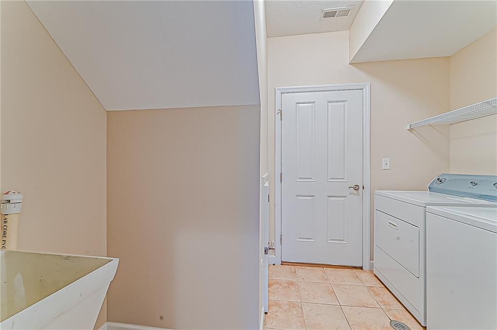 230 Berkeley Way, Unit B Monroeville, PA 15146 - Photo 17 of 25 a view of a kitchen with white cabinets