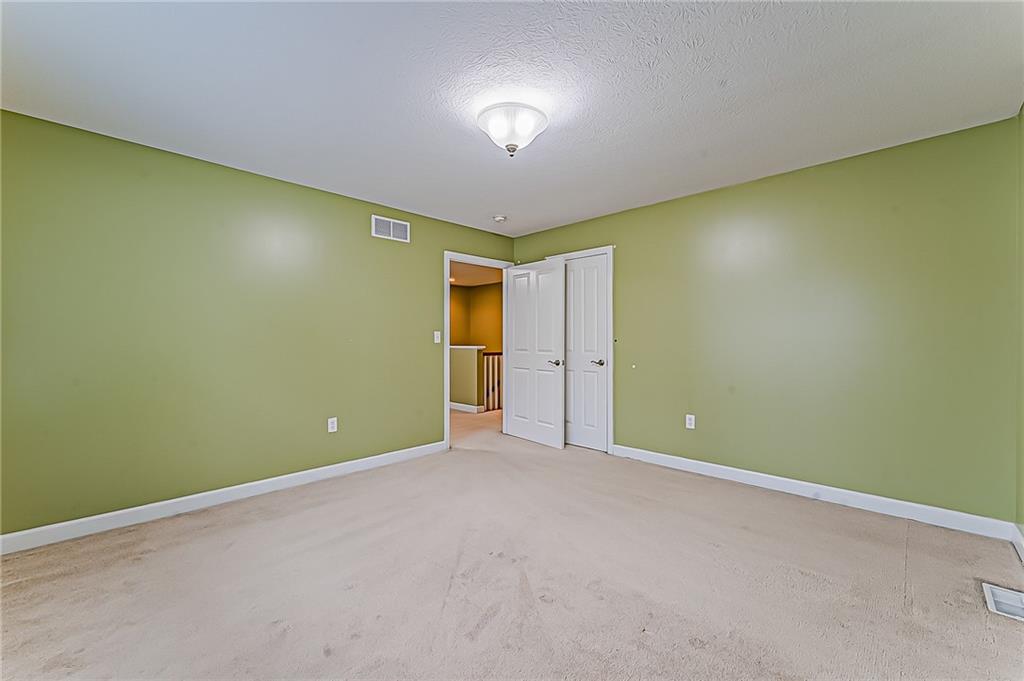 230 Berkeley Way, Unit B Monroeville, PA 15146 - Photo 22 of 25 an empty room with a natural light