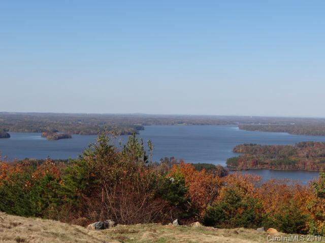 285 Sierra Trace Road Denton, NC 27239 - Photo 20 of 26 a view of a lake and mountain in the back