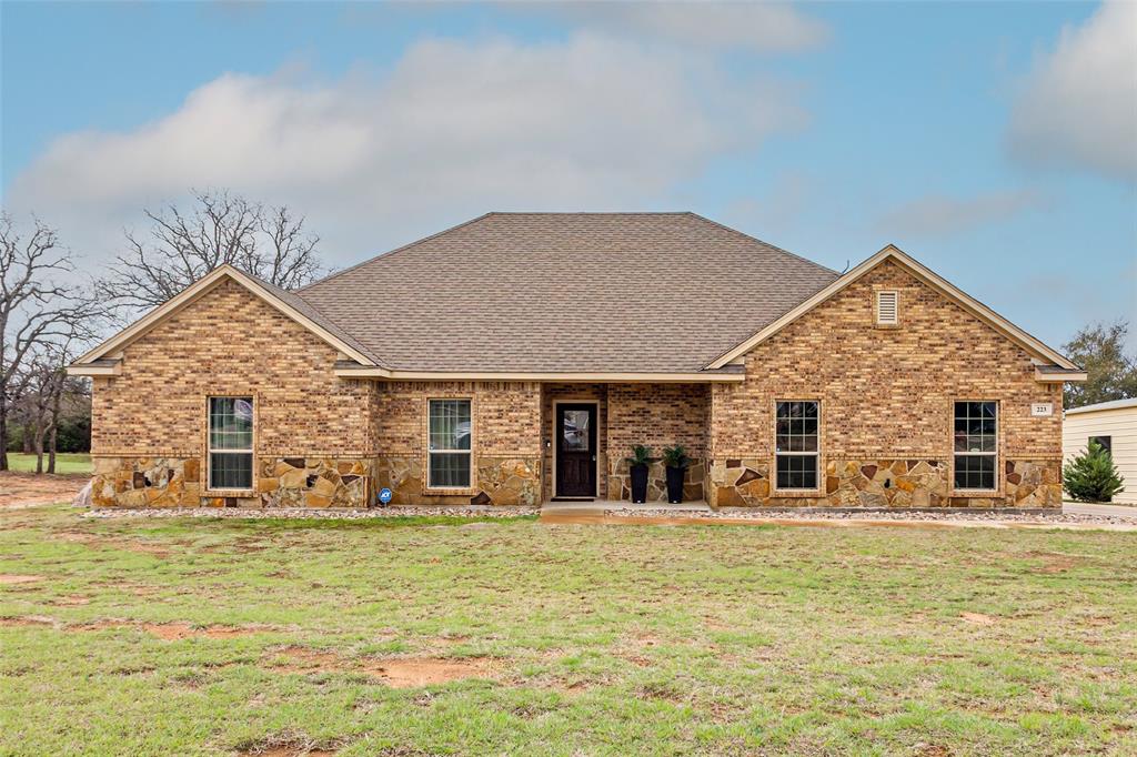 223 Cottongame Road Weatherford, TX 76088 - Photo 2 of 35 a front view of house with yard