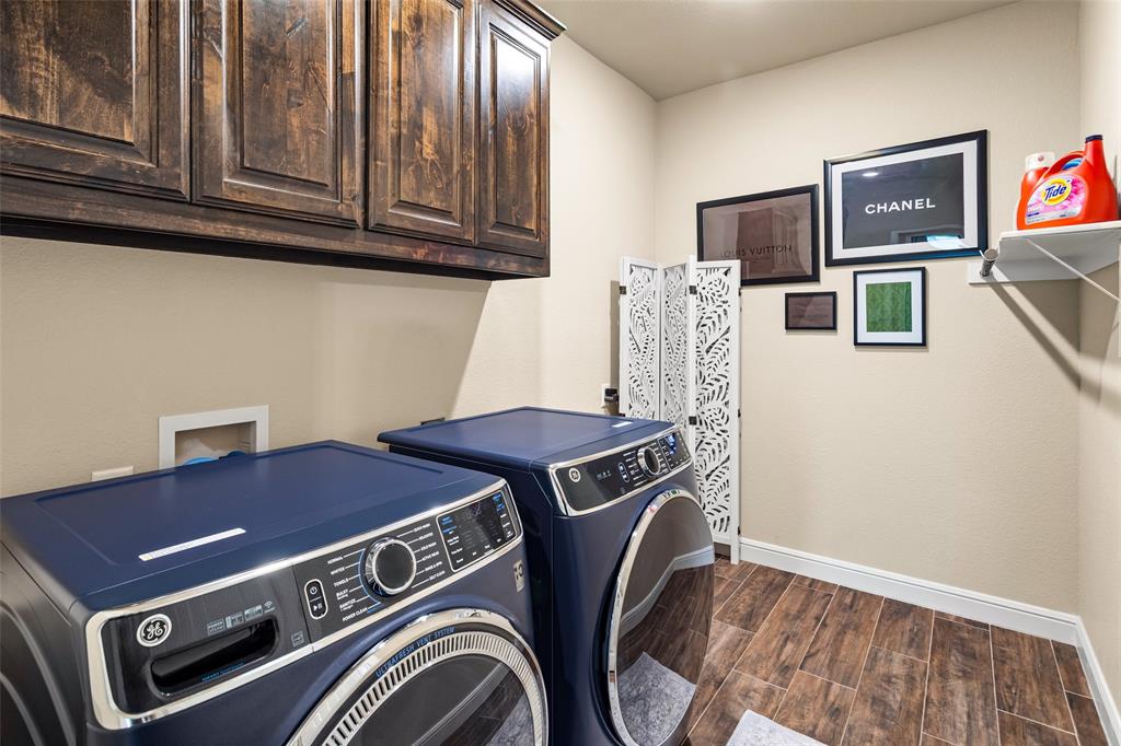 223 Cottongame Road Weatherford, TX 76088 - Photo 23 of 35 a view of livingroom with washer and dryer