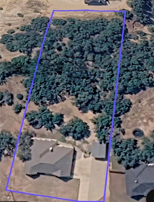 223 Cottongame Road Weatherford, TX 76088 - Photo 33 of 35 an aerial view of a house with a yard