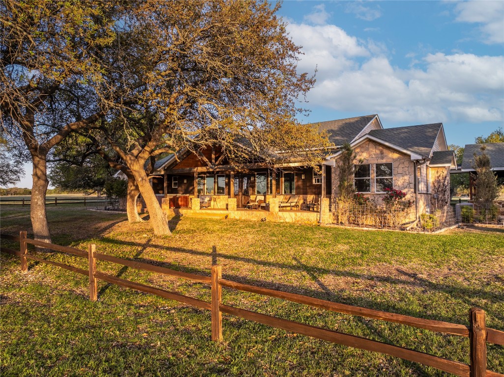 5525 Fm2340 Road Burnet, TX 78611 - Photo 13 of 39 View of front facade with stone siding, a porch, and roof with shingles
