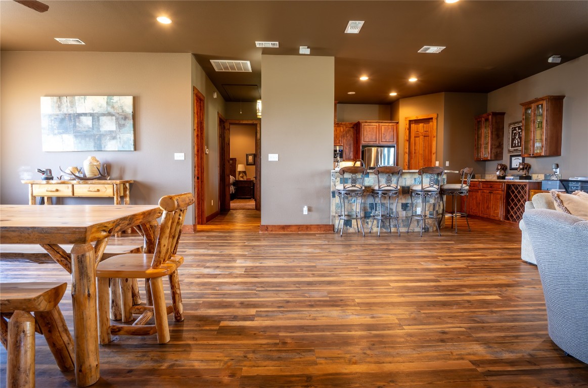 5525 Fm2340 Road Burnet, TX 78611 - Photo 27 of 39 Dining room featuring dark wood-style flooring and recessed lighting