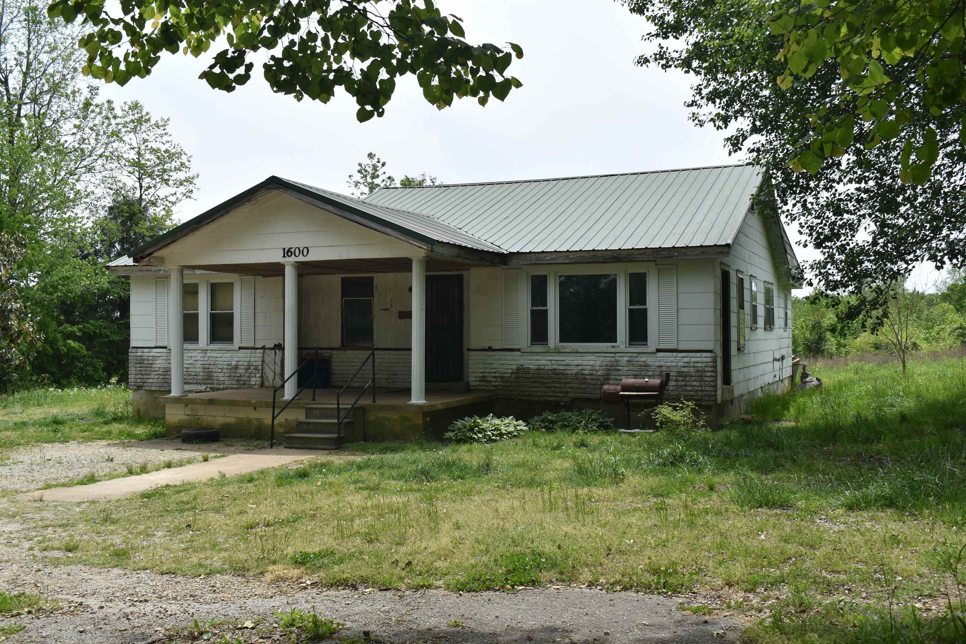 1600 Sticky Ridge Road Reagan, TN 38368 - Photo 1 of 17 a view of a house with a yard