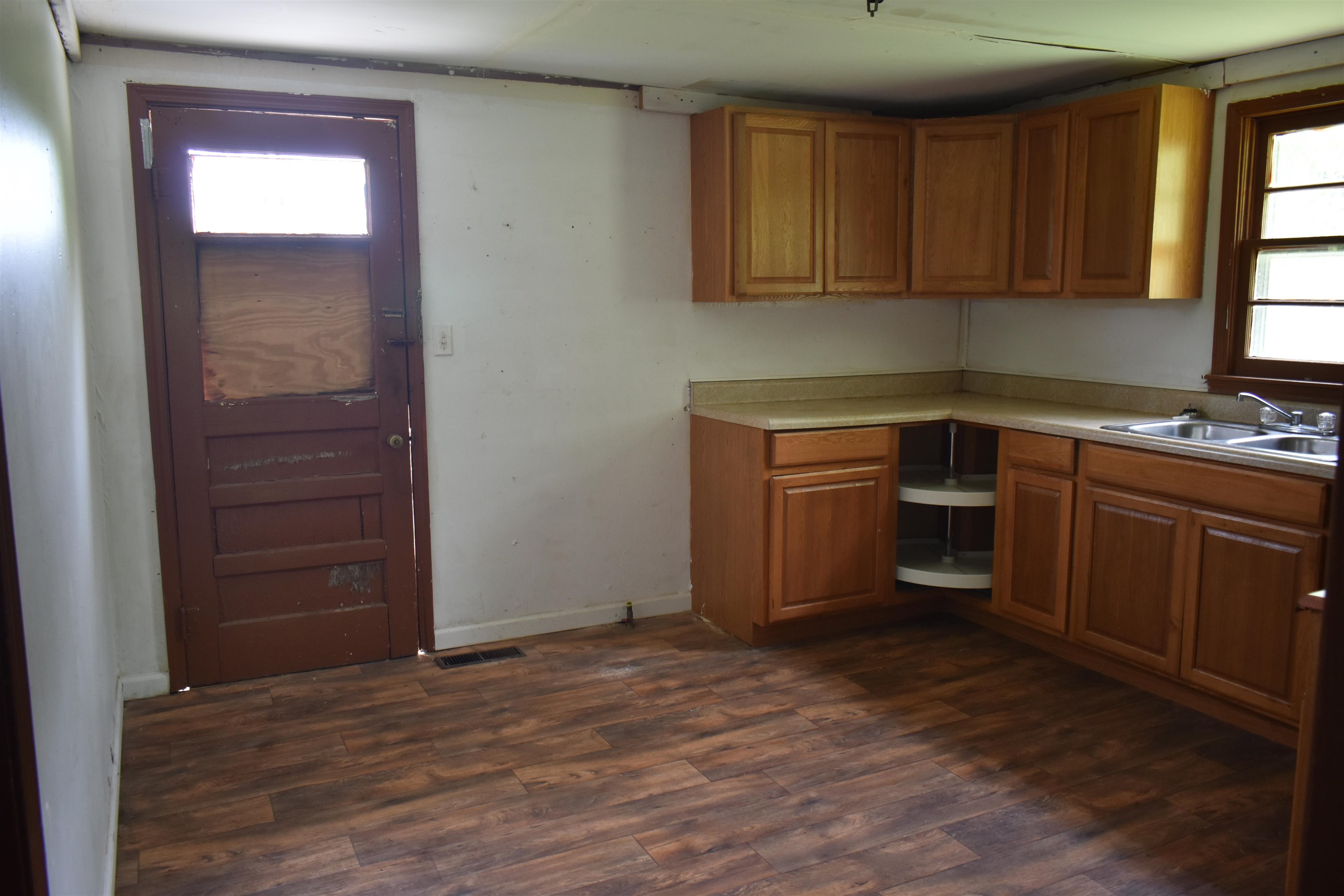 1600 Sticky Ridge Road Reagan, TN 38368 - Photo 11 of 17 a kitchen with a stove and cabinets