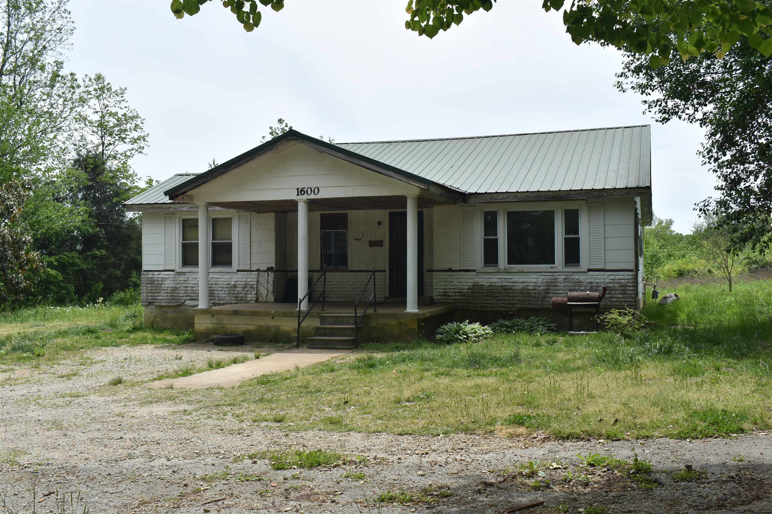 1600 Sticky Ridge Road Reagan, TN 38368 - Photo 2 of 17 a view of front of a house with a yard
