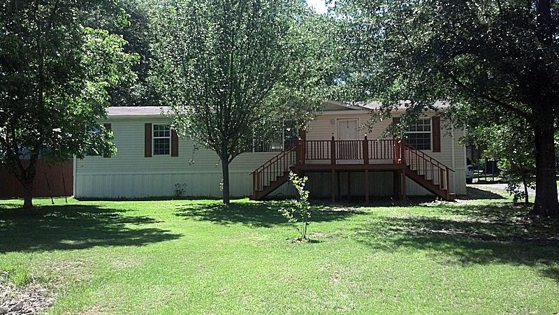 155 Piney Point Drive Murchison, TX 75778 - Photo 1 of 1 a backyard of a house with lots of green space and tree