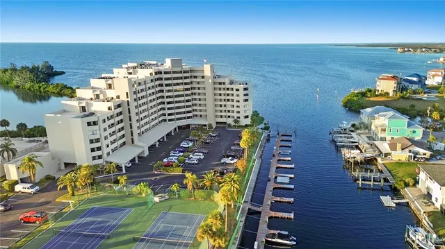 a view of a balcony with seating space