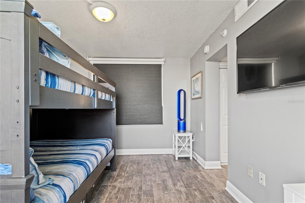 6035 Sea Ranch Drive, Unit 415 Hudson, FL 34667 - Photo 30 of 49 a view of walk in closet with clothes