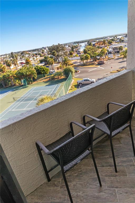 6035 Sea Ranch Drive, Unit 415 Hudson, FL 34667 - Photo 31 of 49 a view of a outdoor seating area