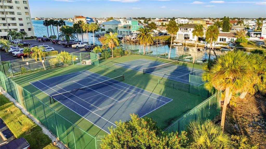 6035 Sea Ranch Drive, Unit 415 Hudson, FL 34667 - Photo 38 of 49 an aerial view of residential houses with outdoor space