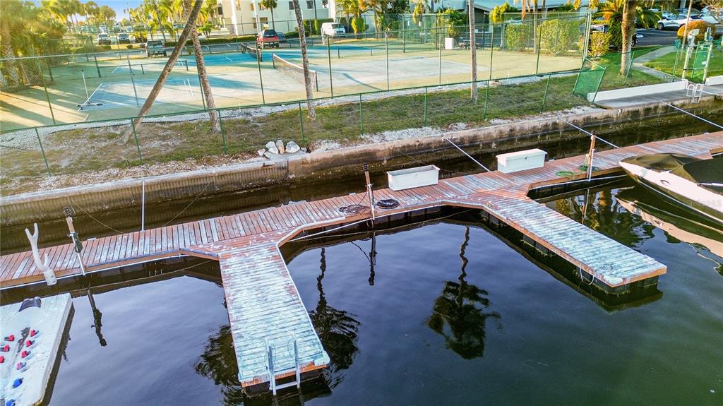 6035 Sea Ranch Drive, Unit 415 Hudson, FL 34667 - Photo 47 of 49 a view of a backyard with sitting area