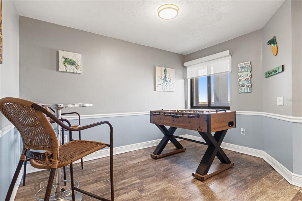 6035 Sea Ranch Drive, Unit 415 Hudson, FL 34667 - Photo 7 of 49 a workspace with furniture