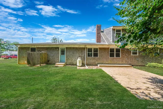 a view of a tree in a yard