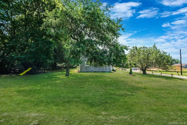 a view of yard with outdoor seating