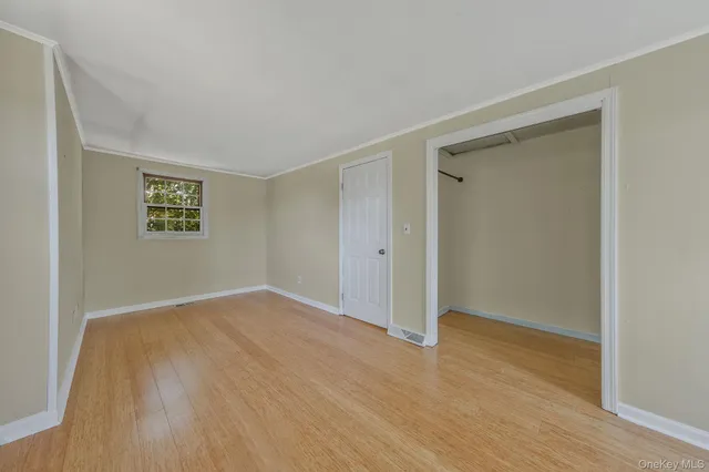 a view of an empty room with a garage