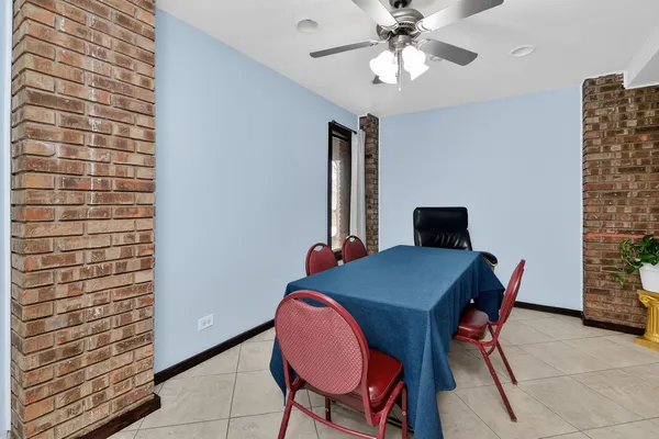 a kitchen with cabinets appliances and a sink
