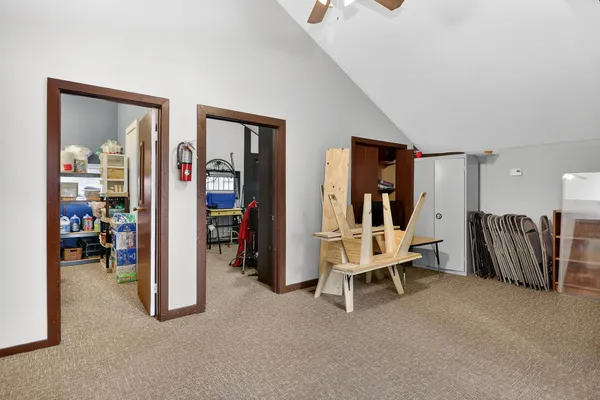 a view of a room with closet and mirror