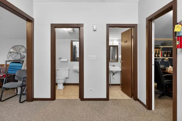 a room with furniture a bookshelf and a bookshelf