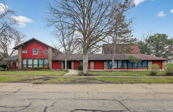 a building with trees in front of it