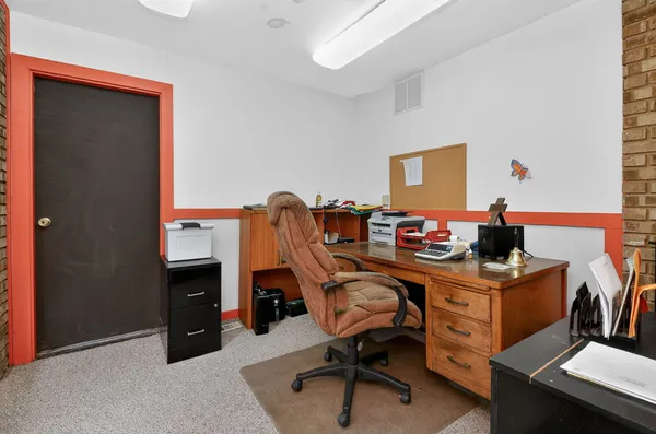 a room with furniture and curtain