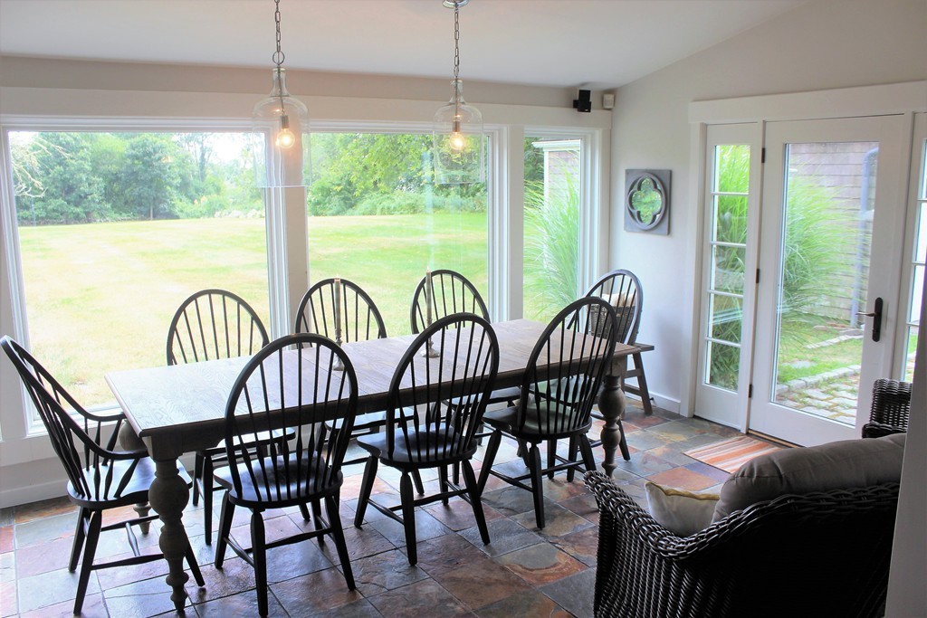 1672 Main Road Westport, MA 02790 - Photo 8 of 26 a view of a dining room with furniture window and outside view
