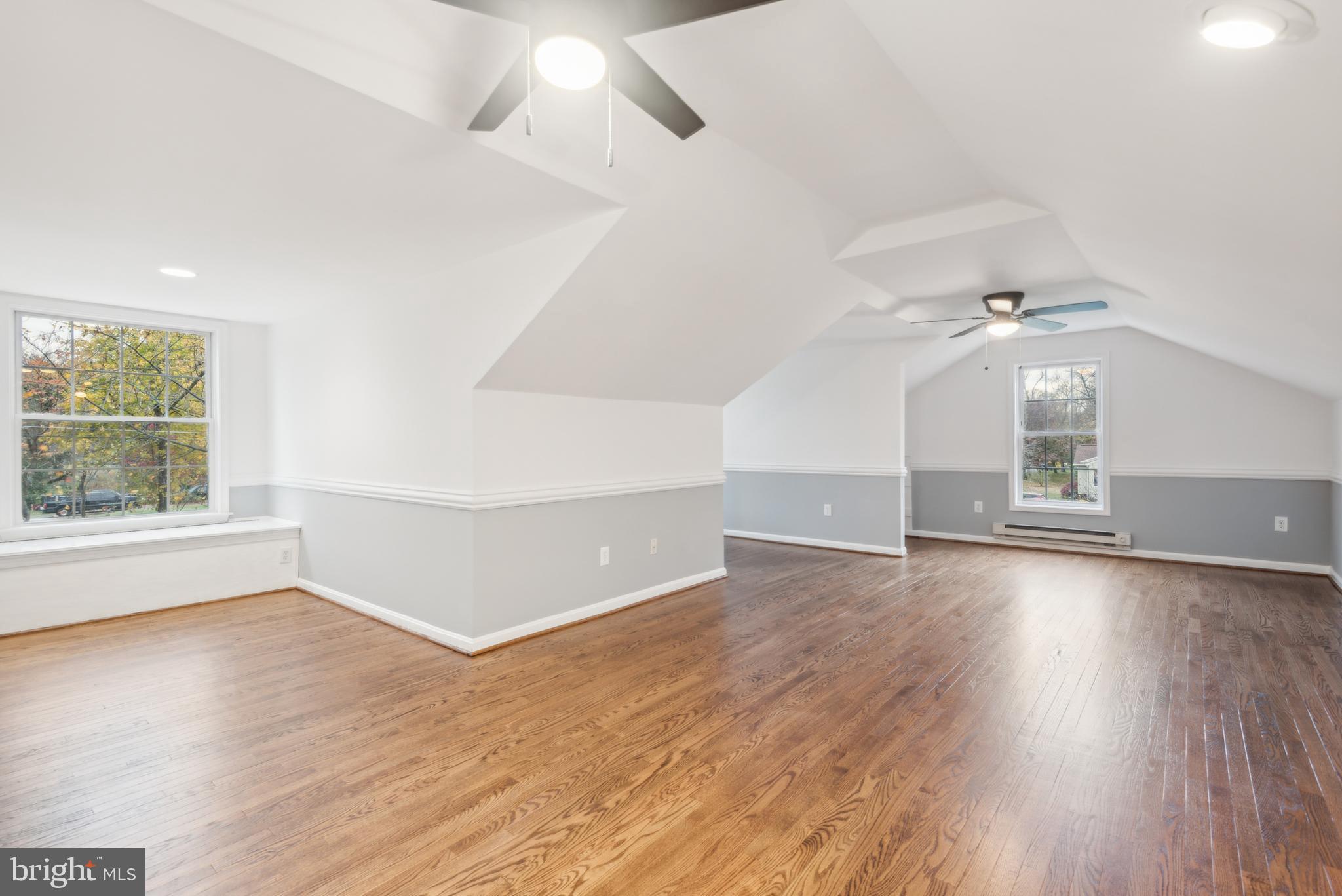 1825 Johnson Road Annapolis, MD 21409 - Photo 20 of 44 wooden floor in an empty room with a window