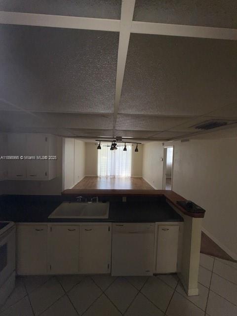 406 Northwest 68th Avenue, Unit 411 Plantation, FL 33317 - Photo 2 of 12 a kitchen with a sink and cabinets