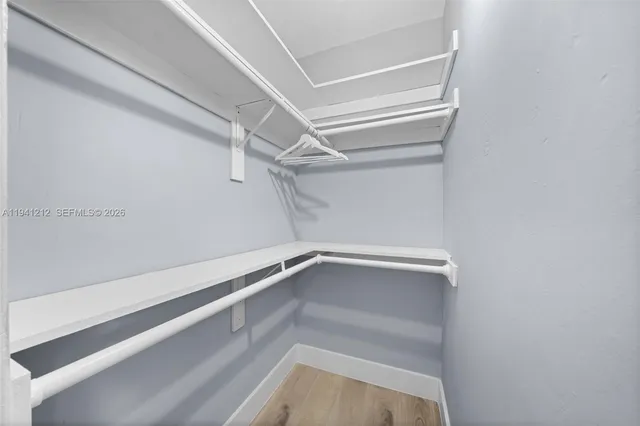 a view of an empty walk in closet