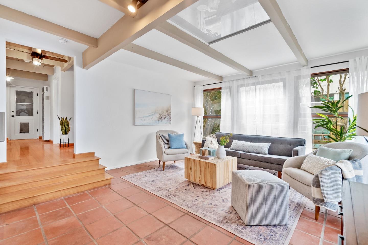 215 Martin Drive Aptos, CA 95003 - Photo 11 of 51 a living room with furniture and a large window
