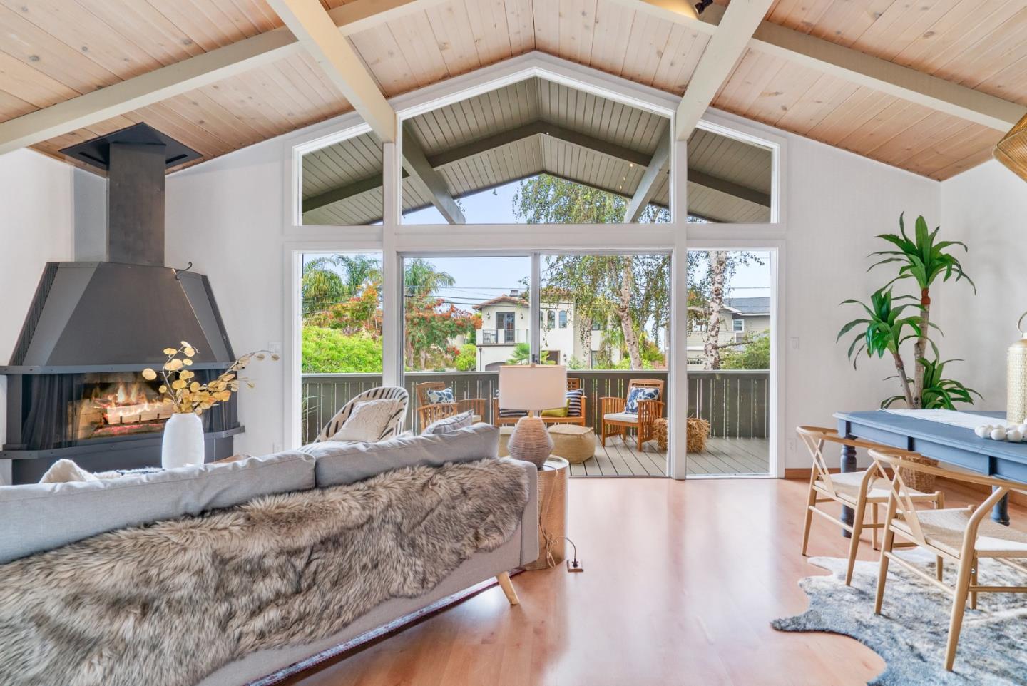 215 Martin Drive Aptos, CA 95003 - Photo 13 of 51 a living room with furniture and a large window