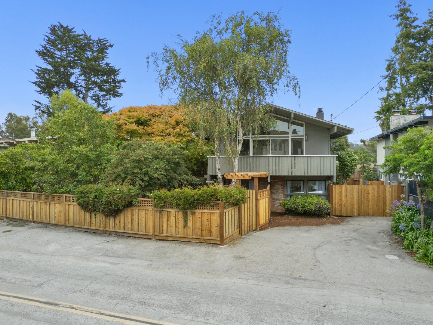 215 Martin Drive Aptos, CA 95003 - Photo 2 of 51 a view of a house with a yard and potted plants