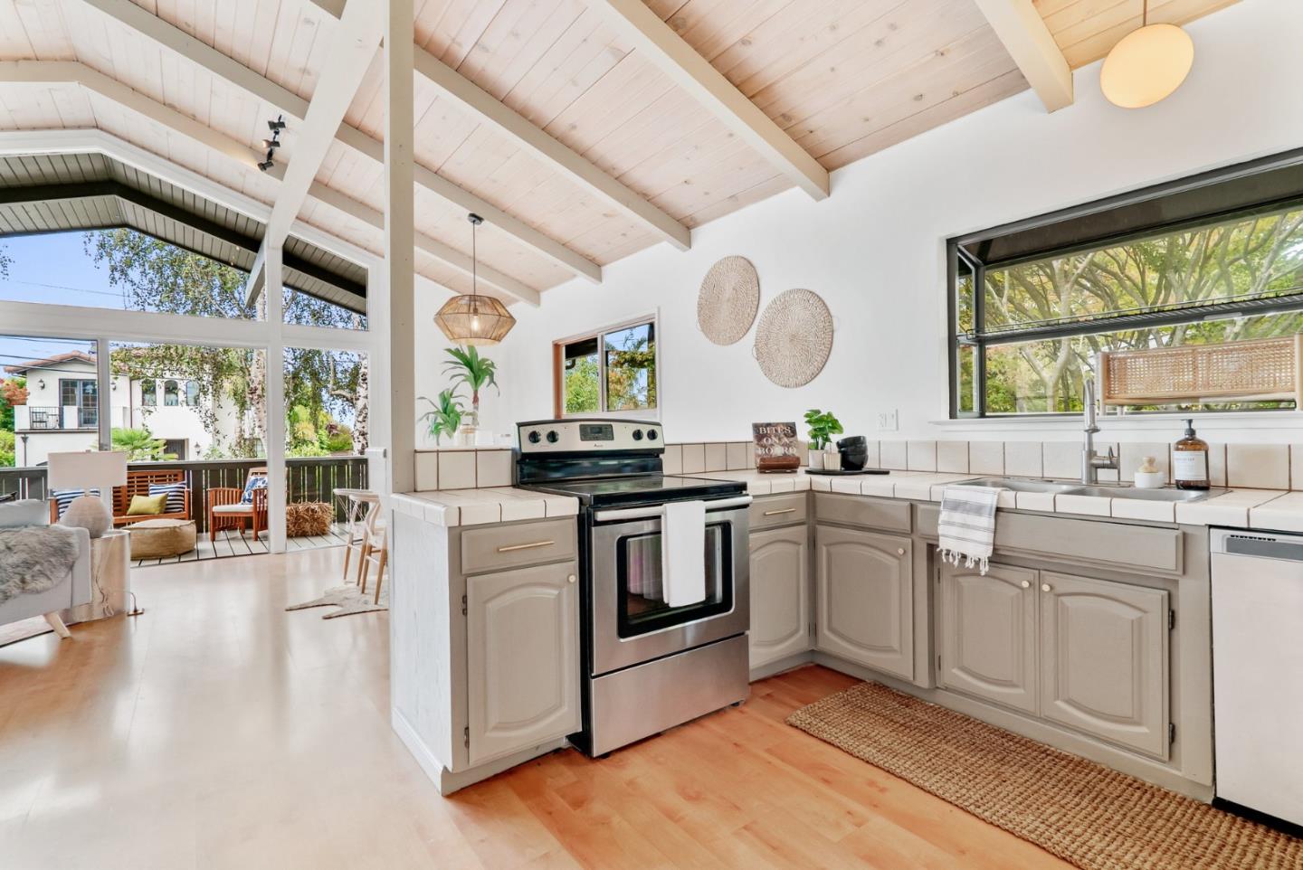 215 Martin Drive Aptos, CA 95003 - Photo 27 of 51 a kitchen with stainless steel appliances granite countertop a stove and a large window
