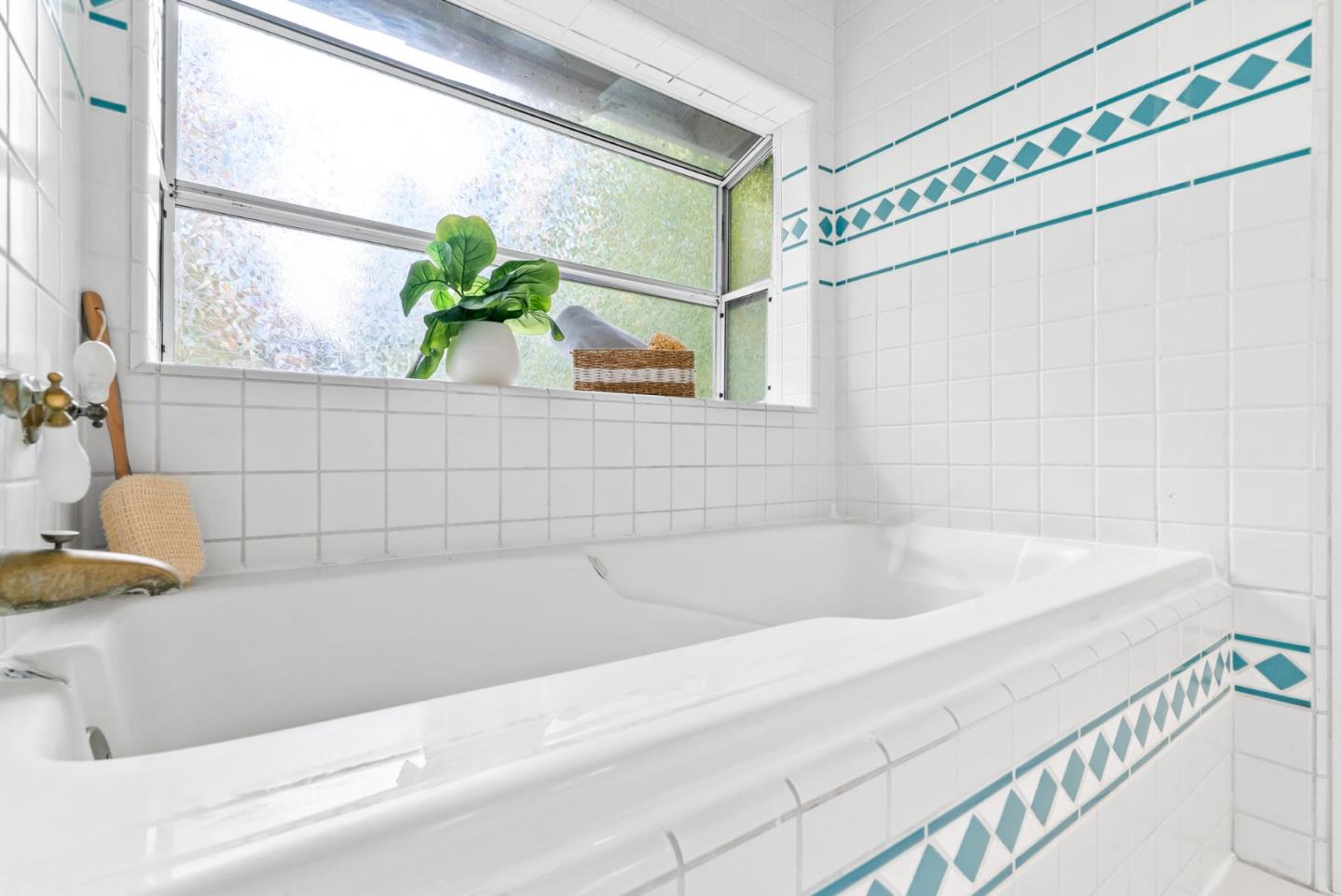 215 Martin Drive Aptos, CA 95003 - Photo 35 of 51 a bathroom with a bathtub and a shower