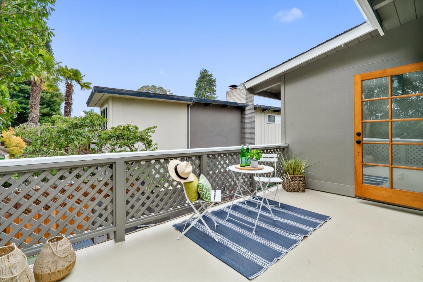 215 Martin Drive Aptos, CA 95003 - Photo 39 of 51 a balcony with wooden floor and outdoor seating