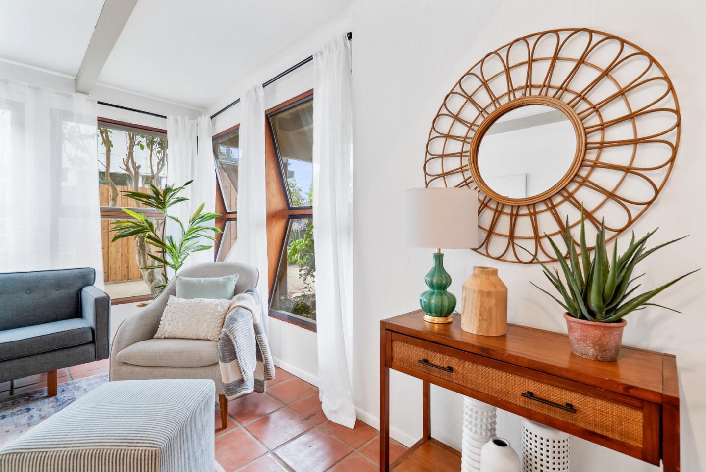 215 Martin Drive Aptos, CA 95003 - Photo 8 of 51 a living room with furniture a table and a potted plant
