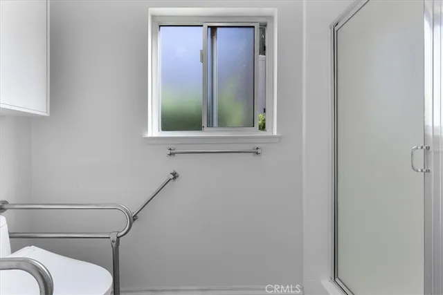 a bathroom with a toilet sink and tub