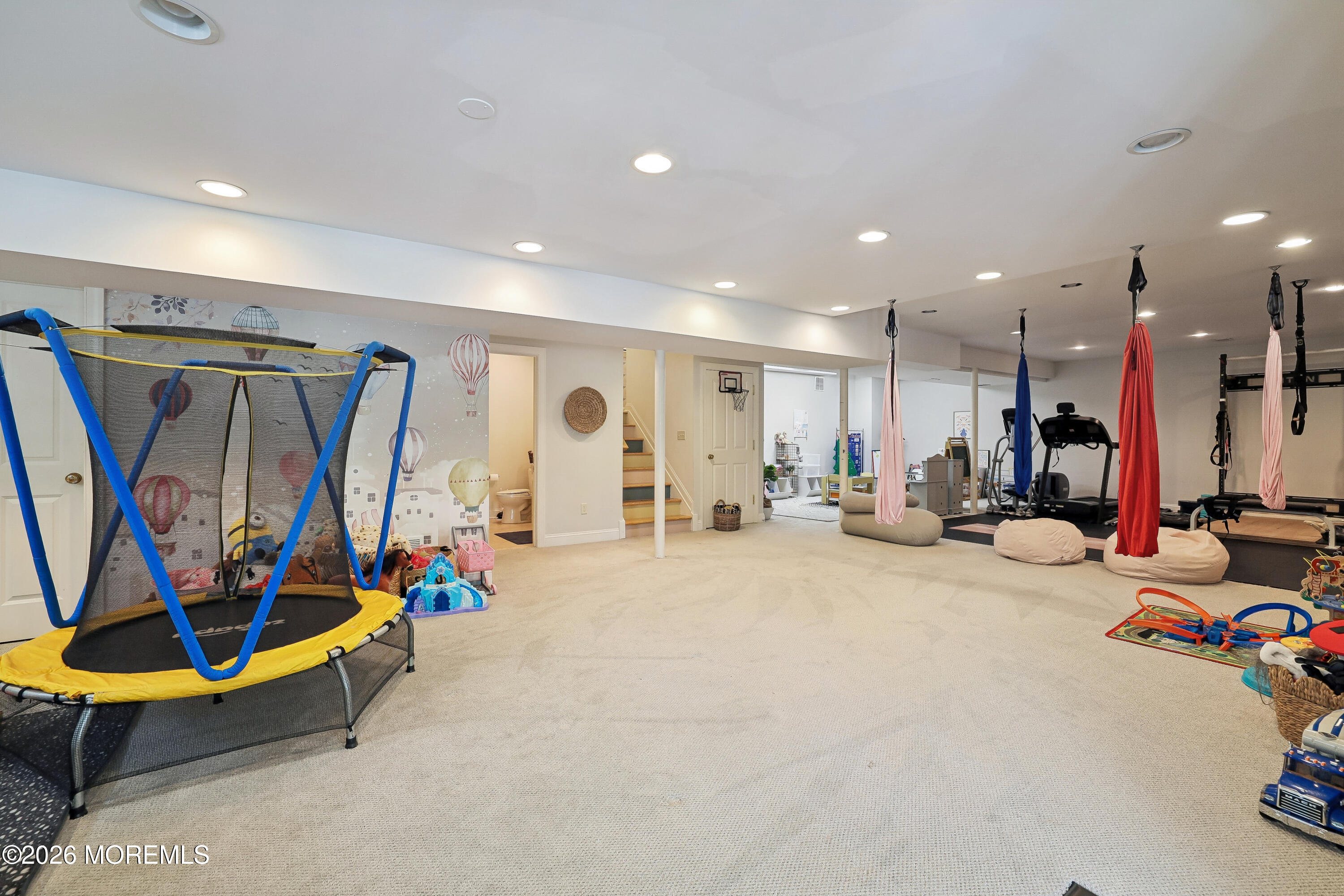 92 Tulip Lane Colts Neck, NJ 07722 - Photo 37 of 55 a view of a room with gym equipment