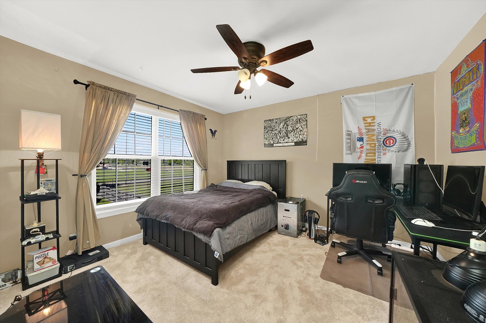 546 Caleb Road Braidwood, IL 60408 - Photo 21 of 34 a living room with a bed furniture and a large window