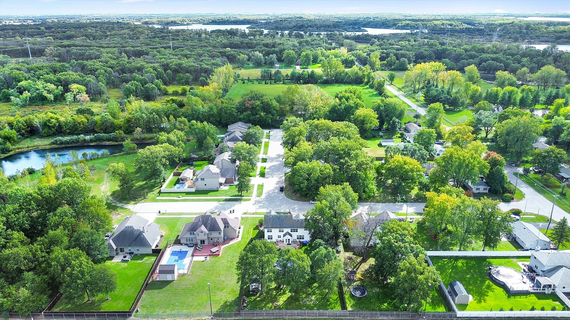 546 Caleb Road Braidwood, IL 60408 - Photo 34 of 34 an aerial view of residential houses with outdoor space and trees