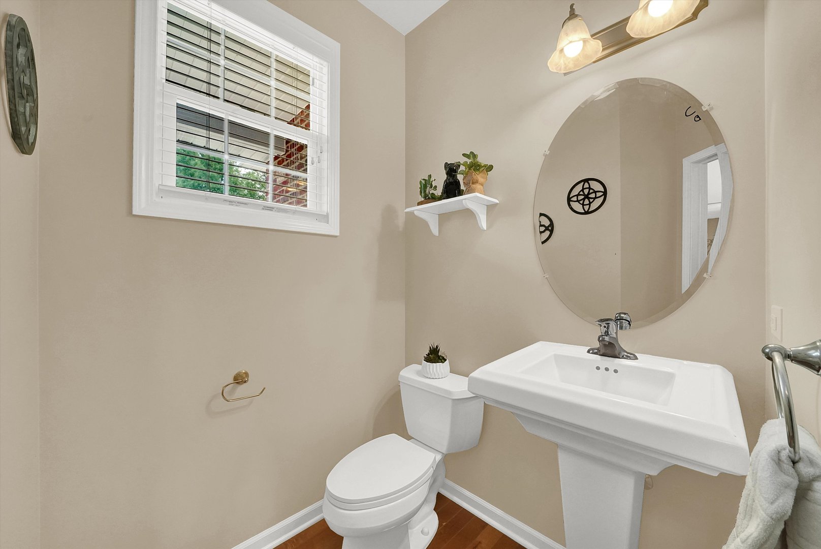 546 Caleb Road Braidwood, IL 60408 - Photo 7 of 34 a bathroom with a toilet sink and mirror