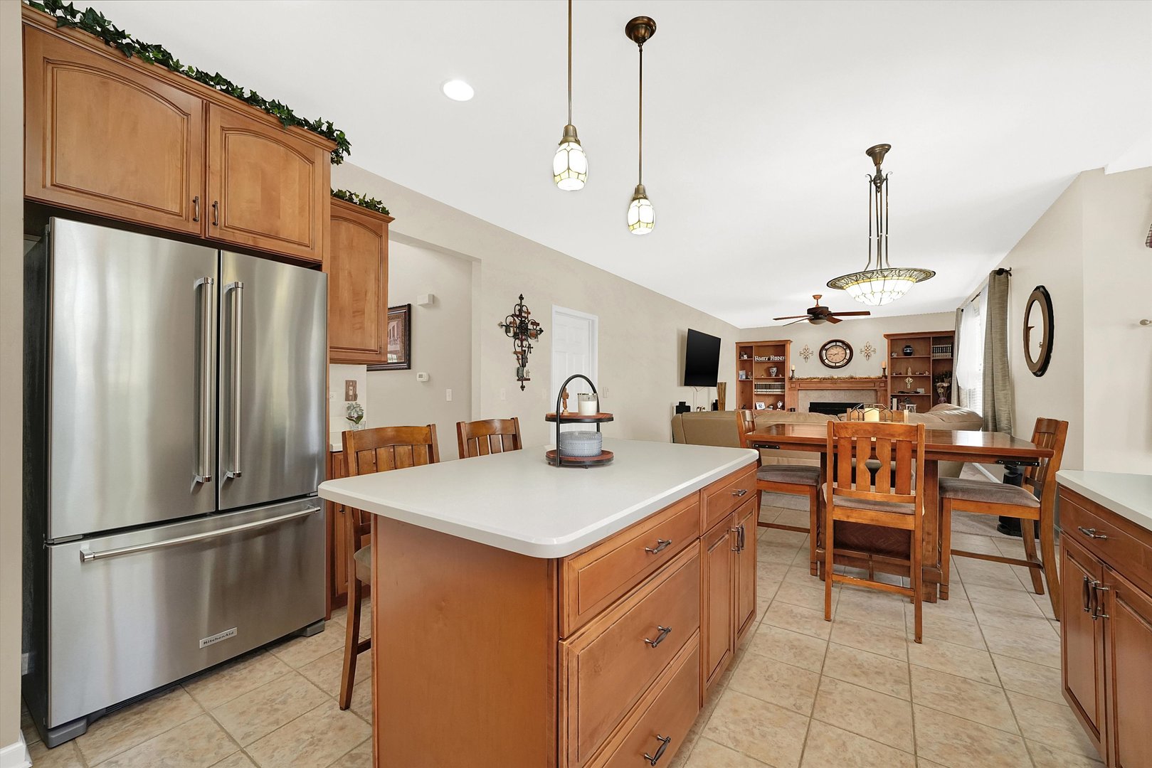 546 Caleb Road Braidwood, IL 60408 - Photo 10 of 34 a kitchen with stainless steel appliances granite countertop a refrigerator a sink and a stove