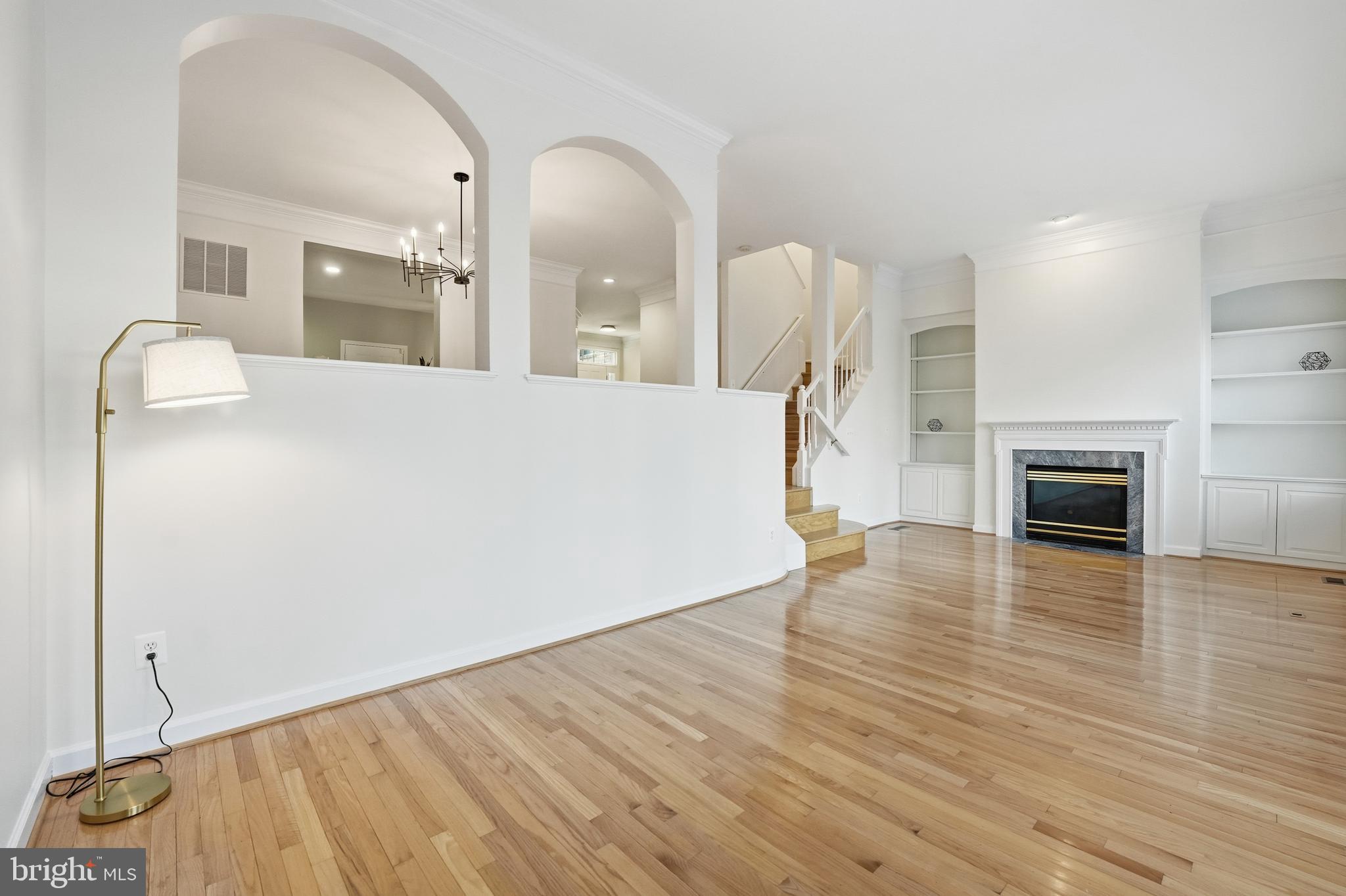 1919 Logan Manor Drive Reston, VA 20190 - Photo 14 of 54 a view of a livingroom with wooden floor