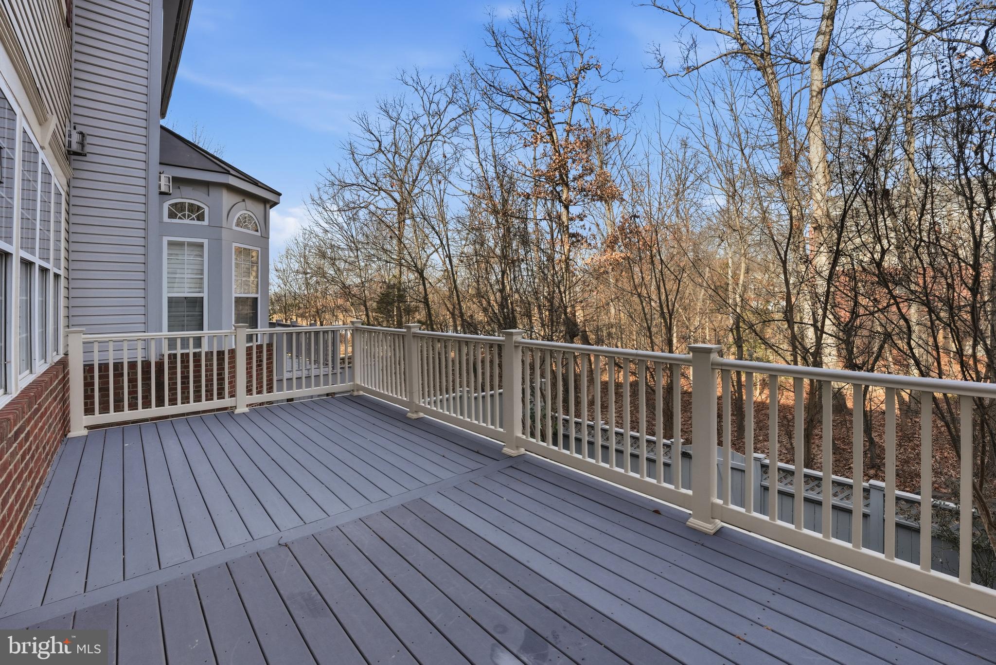 1919 Logan Manor Drive Reston, VA 20190 - Photo 17 of 54 a view of deck with wooden floor and fence