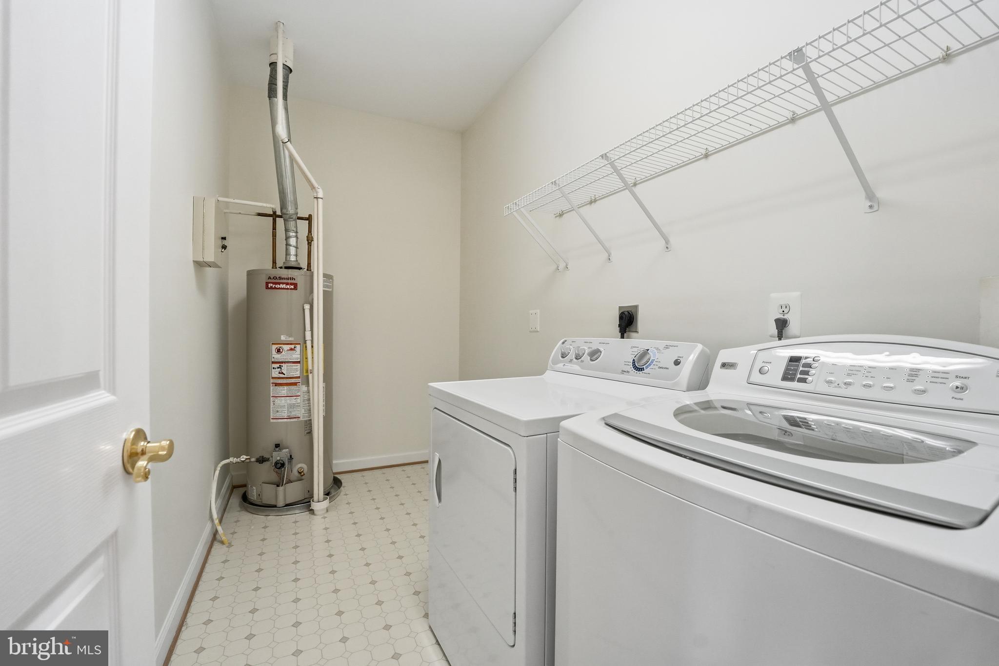 1919 Logan Manor Drive Reston, VA 20190 - Photo 37 of 54 a utility room with dryer and washer